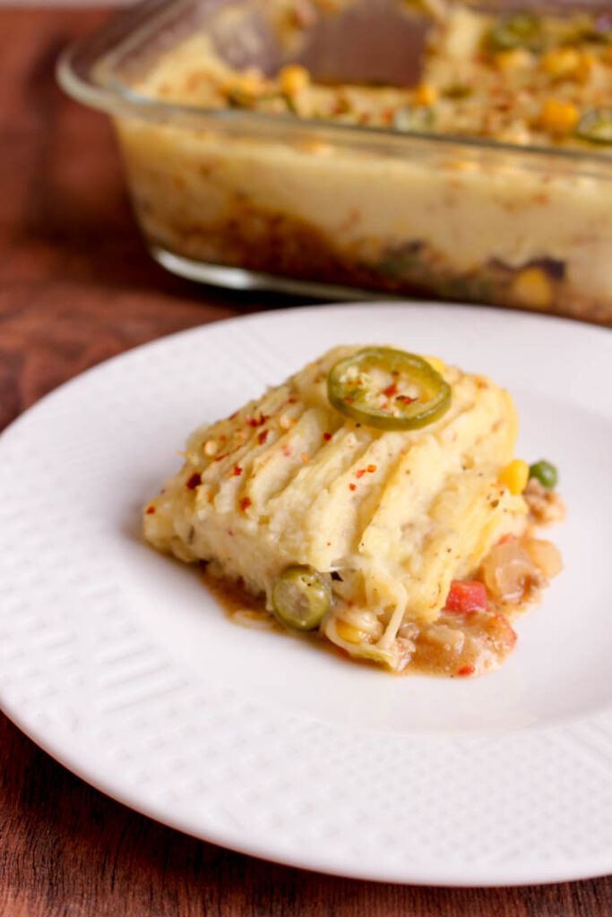 This comforting Shepherd's Pie consists of a layer of chicken mince with vegetables, a light sprinkle of cheese and creamy mashed potatoes on top.
