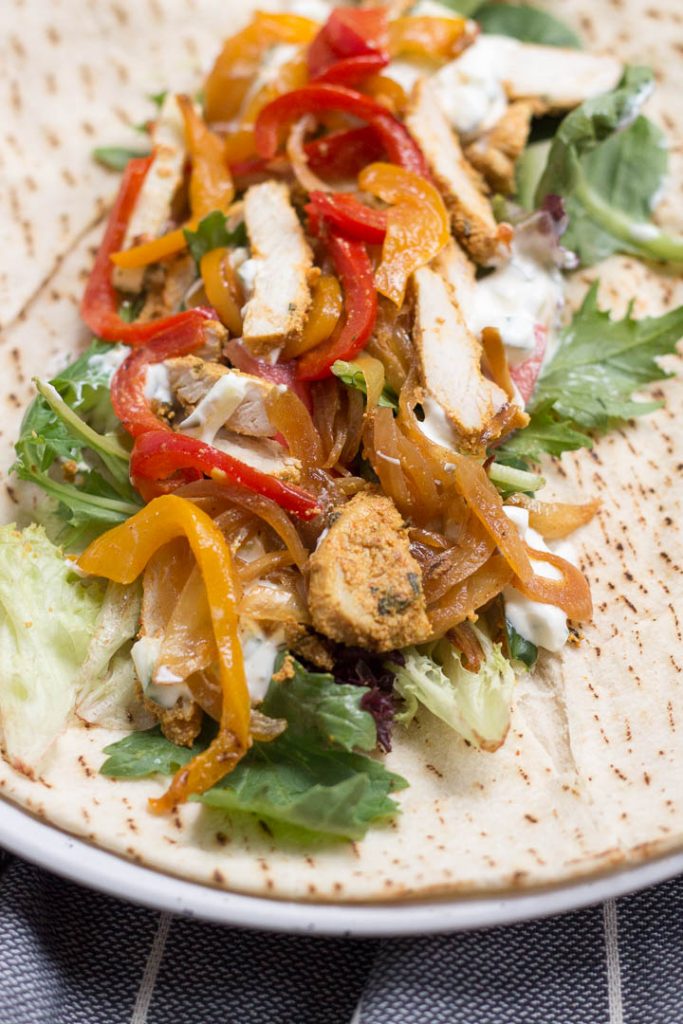 Healthy, delicious, home-made chicken shawarma recipe. Serve this Middle-Eastern dish in a wrap with caramelised onions & capsicum, lettuce, tomato and dollops of tzatziki sauce 
