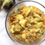 This simple Aloo Baingan sabzi is a mildly spiced vegetarian dish with eggplant/Baingan and chopped potatoes/aloo. Eat with roti or rice.