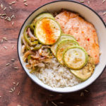 This post gives a detailed explanation of how to make brown rice and a recipe for an Asian style brown rice bowl with chicken and vegetables. 