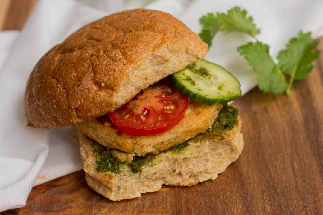 Similar to a burger but far spicier, a bun kabab is the proverbial Pakistani street food snack. It features a potato and lentils patty in a tawa toasted burger bun, with lots of green chutney and sliced vegetables.