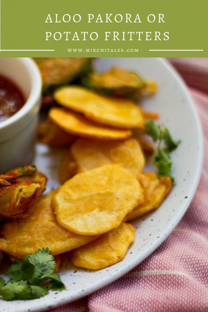 Similar to potato fritters, aloo pakora or aloo pakoda (in Hindi) are a traditional Pakistani / Indian appetizer of sliced potatoes that are coated with a spicy chickpea flour batter and  deep-fried till golden brown. 