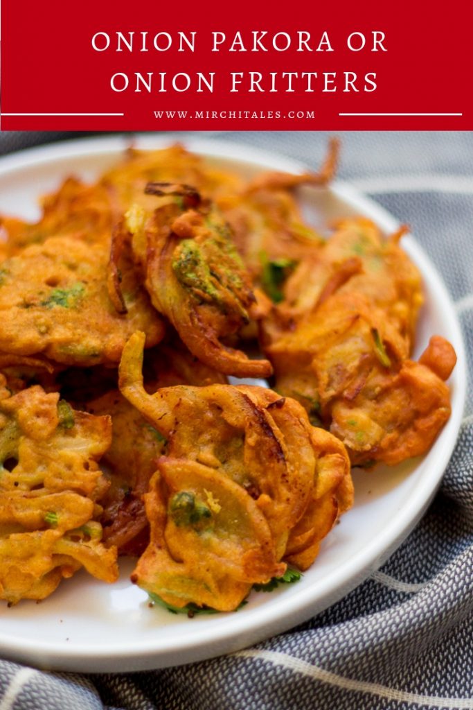 Onion pakora, pyaz pakora or onion fritters are a Pakistani / Indian appetizer made with sliced onion and coriander coated with a spicy chickpea flour batter and  deep-fried till crispy.