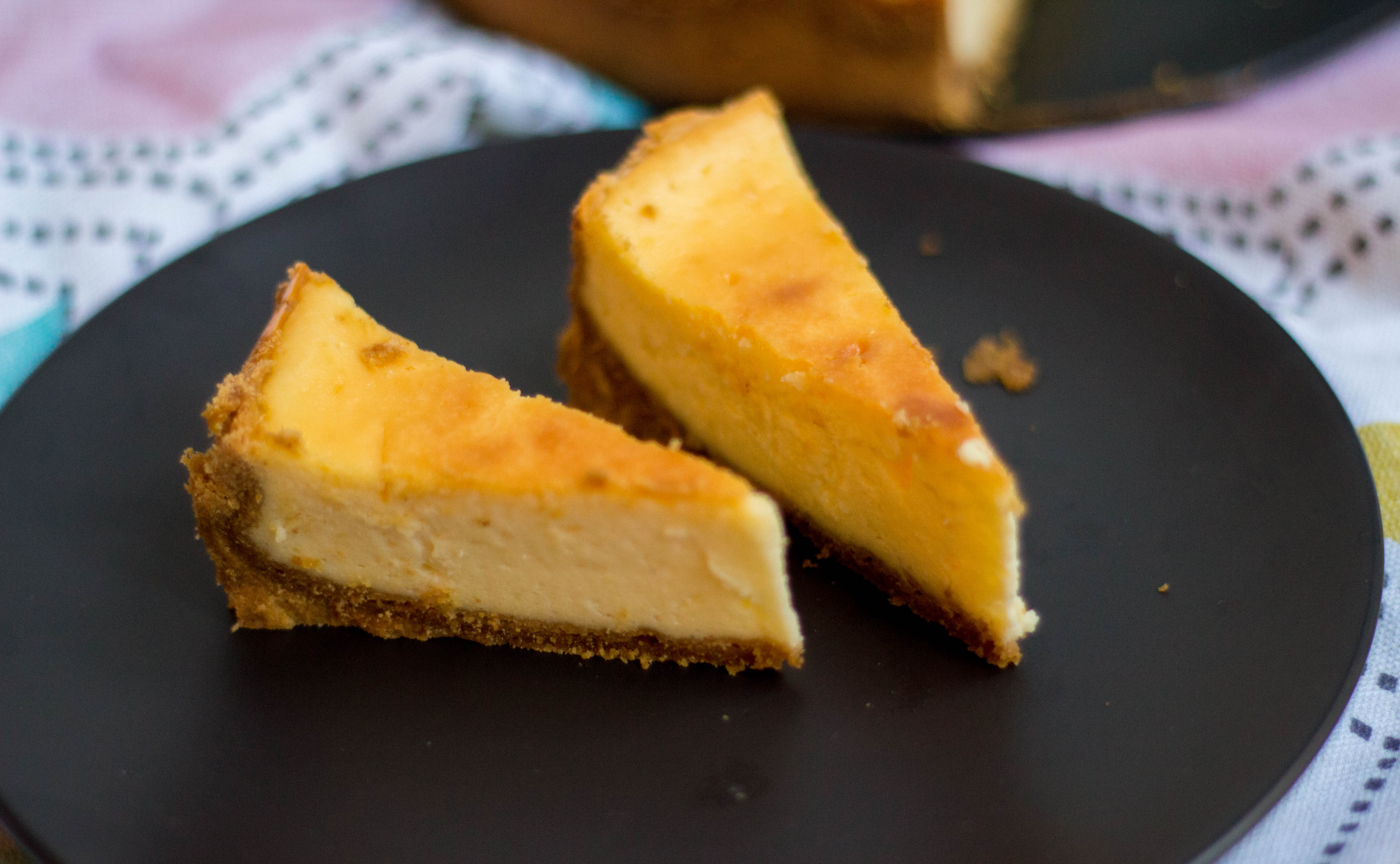 This classic baked cheesecake is super simple to make and makes a cheesecake that is smooth and creamy with a hint of lemon. Serve it plain or with fruits on side. 