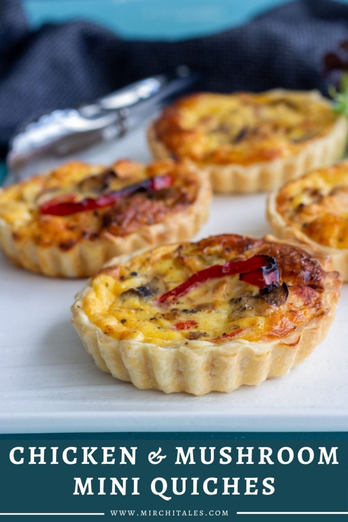 Four chicken and mushroom mini quiches with roasted capsicum on a white platter. There's a silver tong in the background.
