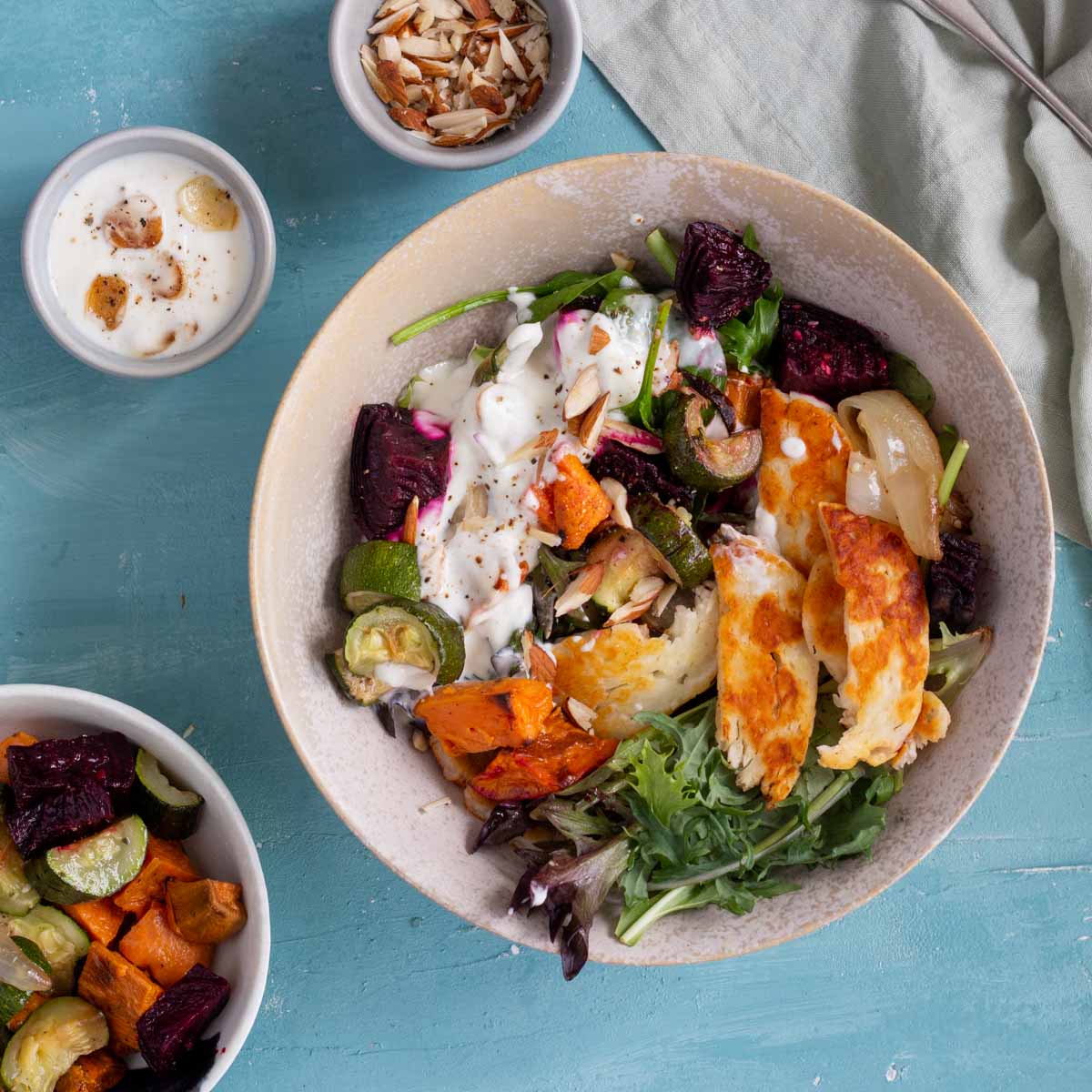 Brown rice, broccoli, feta and halloumi salad