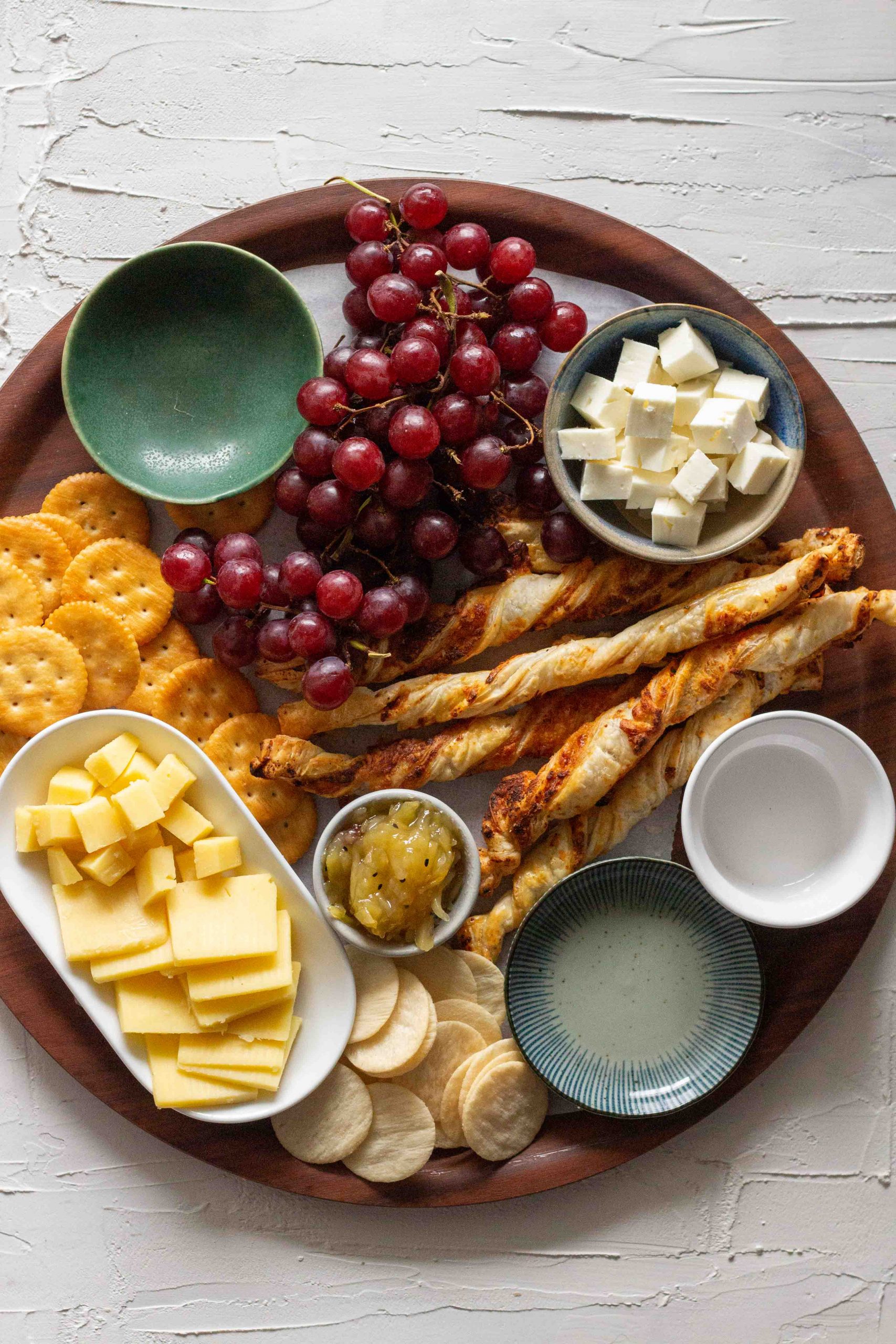 Setting out elements for a cheese board. 