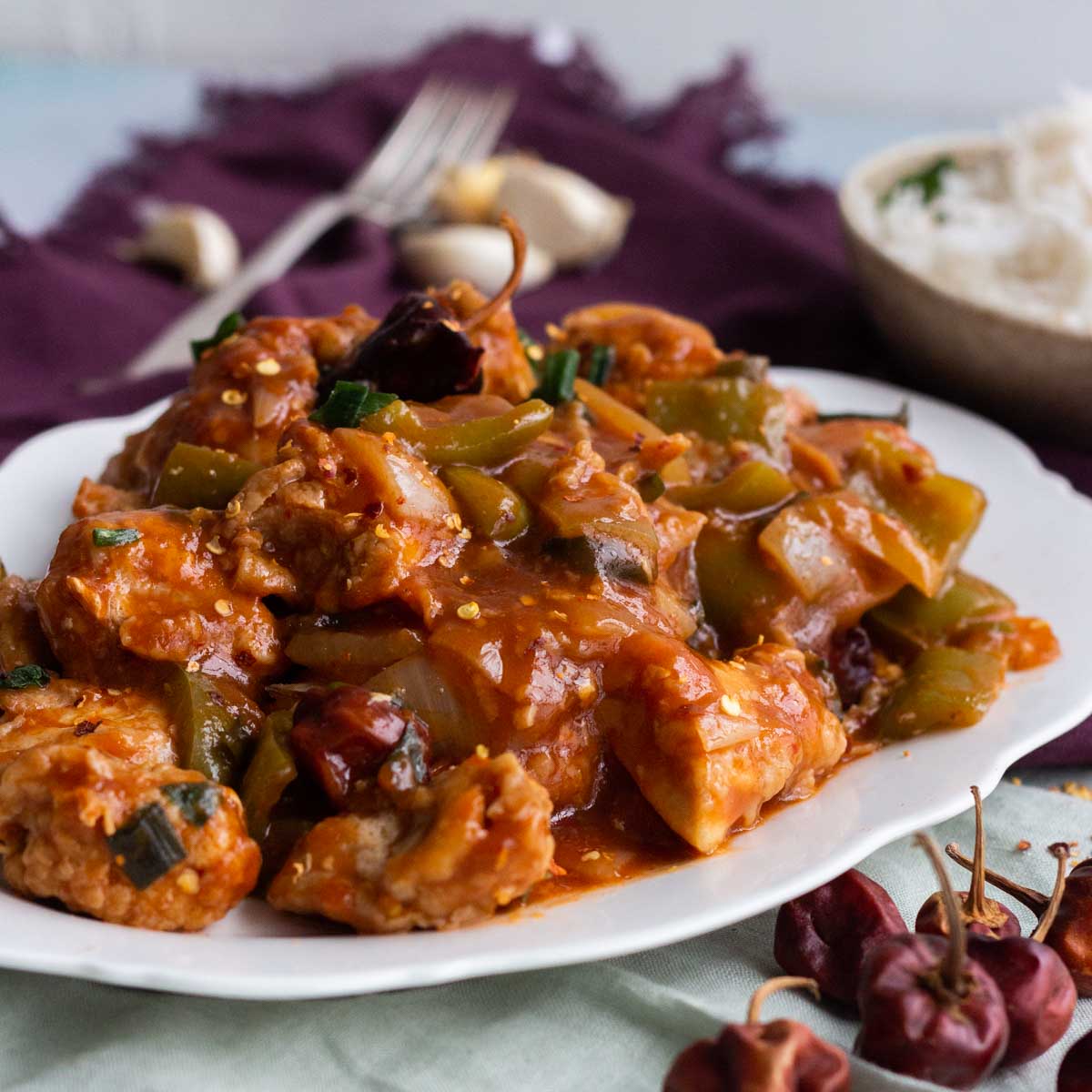 Indo Chinese style chicken manchurian served on a white platter.