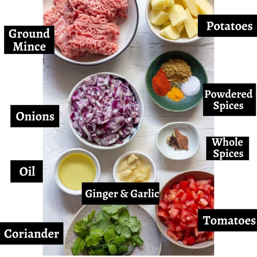 Ingredients laid out to make aloo keema.